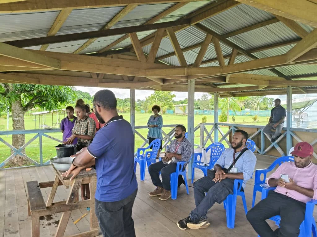 Participants engage in a hands-on demonstration during a recent community health outreach program. The workshop provided valu