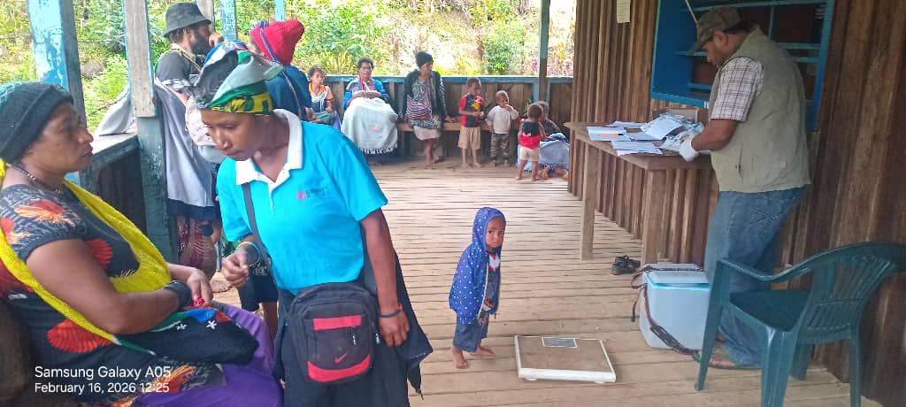 ECPNG Health Services staff engage with women and families during a community outreach clinic, bringing essential care and su